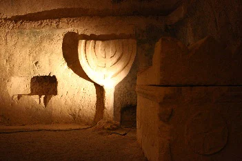Ancient menorah carving Beit Shearim catacomb wall